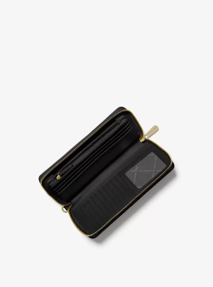 Jet Set Travel Large Pebbled Leather Wristlet Jet Set Travel Large Pebbled Leather Wristlet